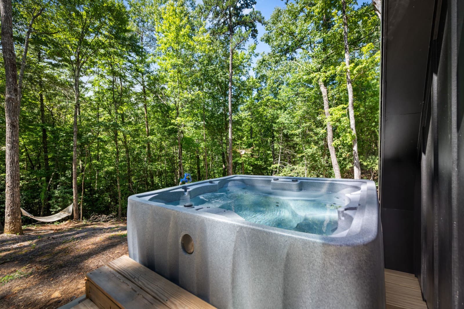Private hot tub beside the A-frame